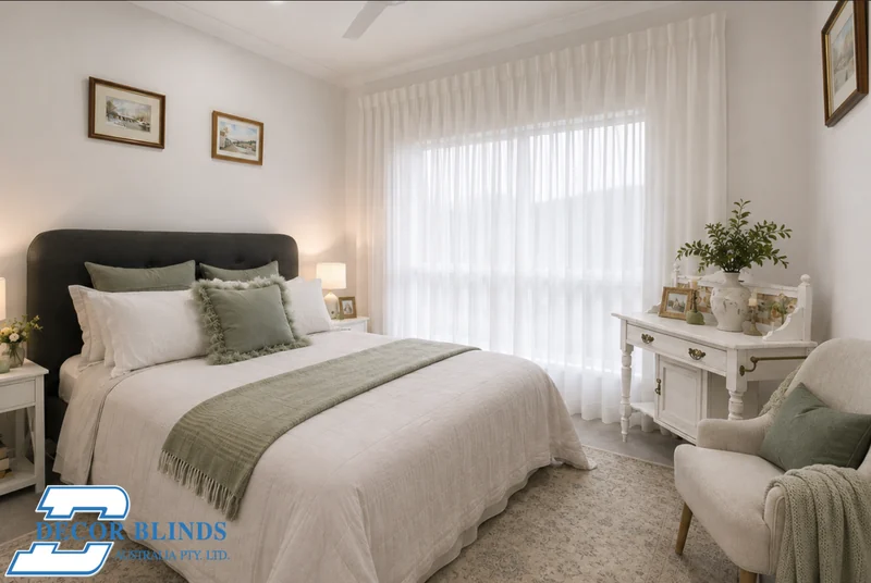 Sheer Elegant Shades across a corner window in a sage-toned bedroom
