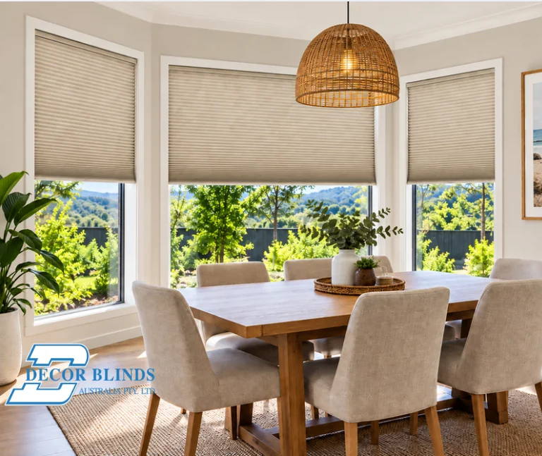 Honeycomb blinds half raised on three dining room windows