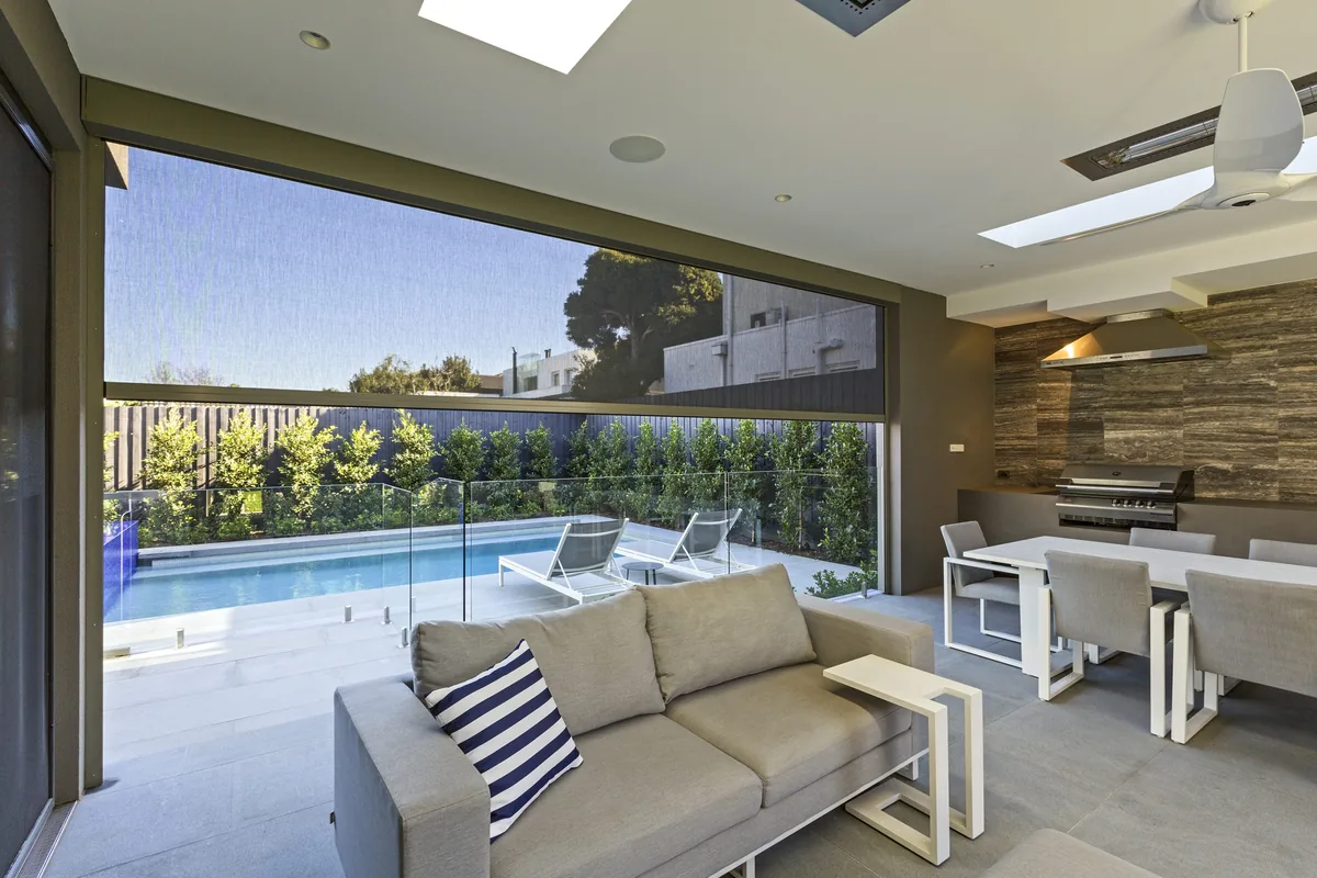 Outdoor alfresco area shaded by Decor Blinds ZipScreen outdoor blinds and aluminium shutters