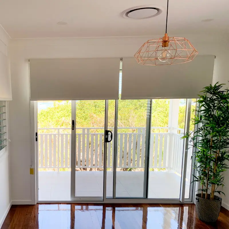 Modern roller blinds fitted to a Brisbane home window
