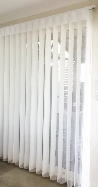 Veri Shades fabric panels beside a window