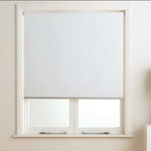 Window with white roller blind
